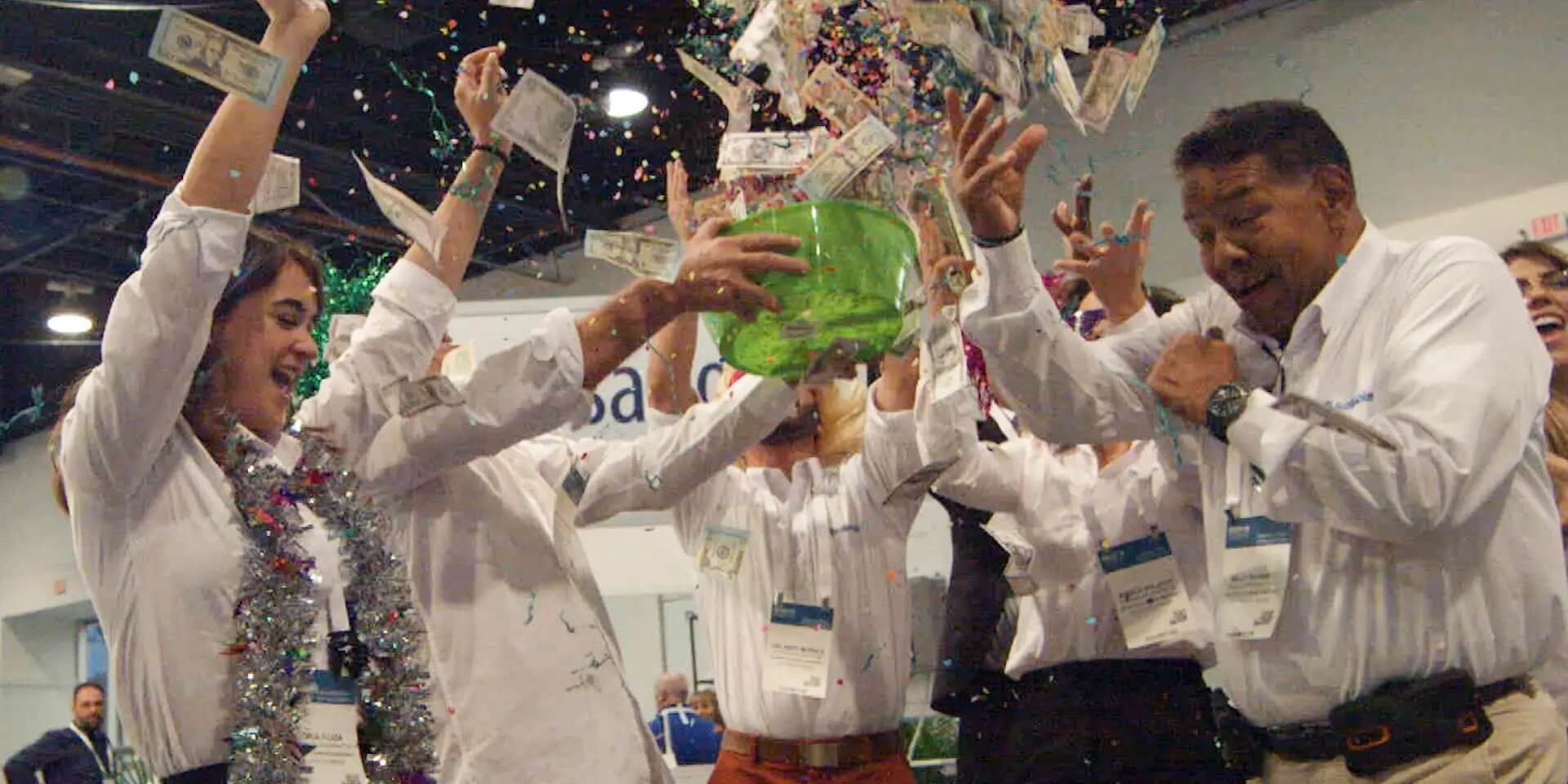 Guests celebrating with confetti at a live event activation